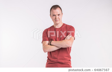 Elegant young handsome man. Studio fashion portrait. White background. 64867387
