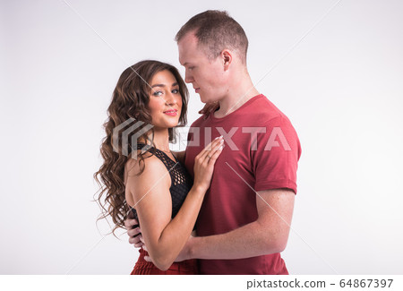 Salsa, kizomba and bachata dancers on white background. Social dance concept. Salsa, kizomba and bachata dancers on white background. Social dance concept. 64867397