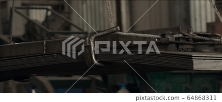 Aluminum metal sheets stacked big wire rope sling Aluminum metal sheets stacked big wire rope sling 64868311