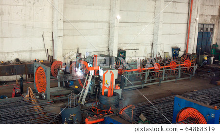 Engineer checking and controlling welding 64868319