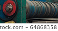 Metal rolls of roll forming machine at a metalwork 64868358