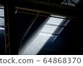 Upper part of window in beams of luminous lights 64868370