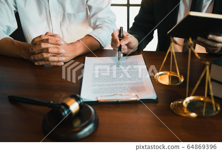 Lawyer explained to the client about the legal Lawyer explained to the client about the legal 64869396
