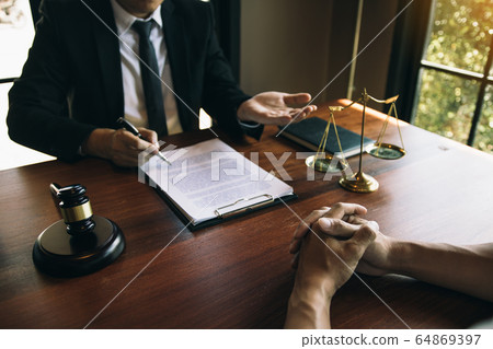 Client is explaining the offense to the lawyer and Client is explaining the offense to the lawyer and 64869397