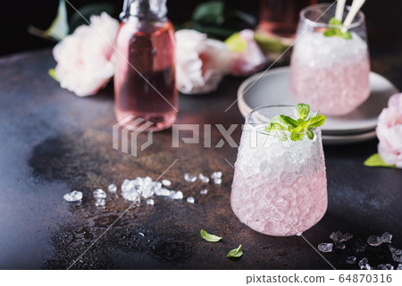 Pink cocktail with mint 64870316