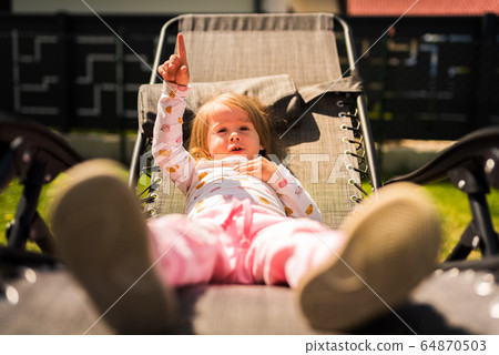 Portrait of a beautiful little 2 years old girl in Portrait of a beautiful little 2 years old girl in 64870503