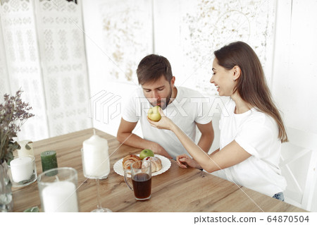 Beautiful couple spend time at home Beautiful couple spend time at home 64870504