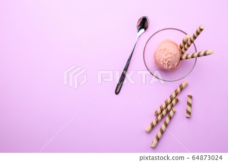 Berry sorbet ice cream with waffles in glass bow 64873024