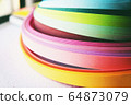 Rainbow paper abstract macro 64873079