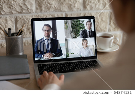 Businesspeople have webcam conference using laptop gadget 64874121