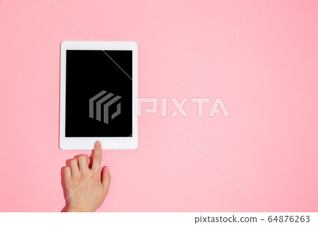 Hand using gadget, device on top view, blank screen with copyspace, minimalistic style Hand using gadget, device on top view, blank screen with copyspace, minimalistic style 64876263