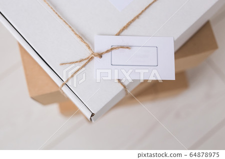 Set of parcel tie hemp cord. Delivery service. Online shipping. Holidays gifts concept. Many presents. 64878975
