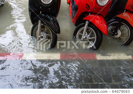 motorcycles are parking in street with the motorcycles are parking in street with the 64879083