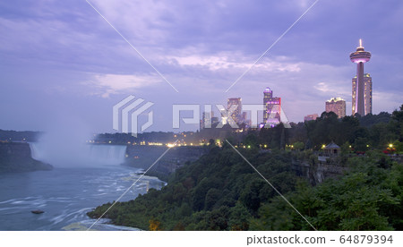 Niagara Falls and city skyline at dusk, Canadian side Niagara Falls and city skyline at dusk, Canadian side 64879394