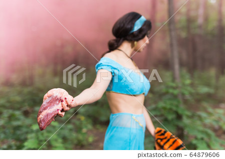 Woman calls stop eating meat. Vegetarian campaign against kills animals. Eco friendly behaviour. Protect the animals. 64879606