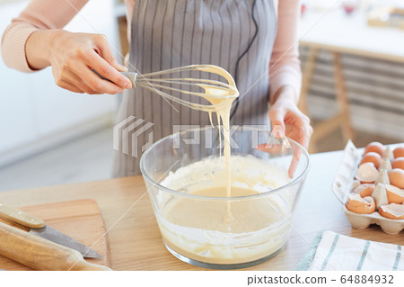 Mixing Ingredients For Dough 64884932