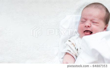 infancy, childhood, family, care, medicine, sleep, health concept - banner portrait of newborn baby wrapped in diaper on white background, copy spase, mock up, close-up, crop, soft focus, top view. 64887353