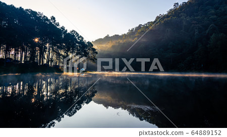 The landscape of the reservoir and the morning fog The landscape of the reservoir and the morning fog 64889152