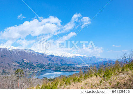 Lake Aoki and Gotateyama Mountain Range seen from Omachi City, Gongen Mountain (April) 64889406