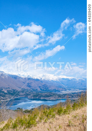 Lake Aoki and Gotateyama Mountain Range seen from Omachi City, Gongen Mountain (April) 64889409