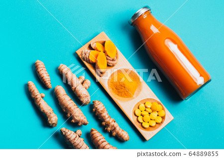 Turmeric in different conditions: fresh, dry root, pills, powder and cut plant. Turmeric in different conditions: fresh, dry root, pills, powder and cut plant. 64889855