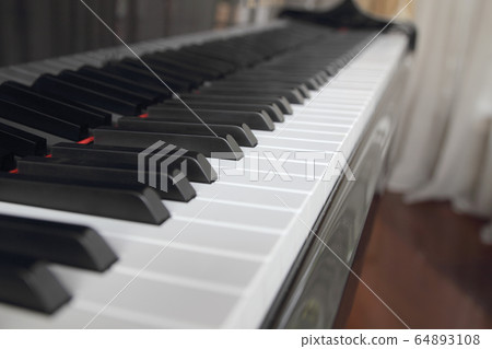close-up of piano keys. close frontal view. close-up of piano keys. close frontal view. 64893108