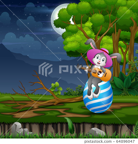 Cartoon rabbit playing guitar on a big Easter egg Cartoon rabbit playing guitar on a big Easter egg 64896047