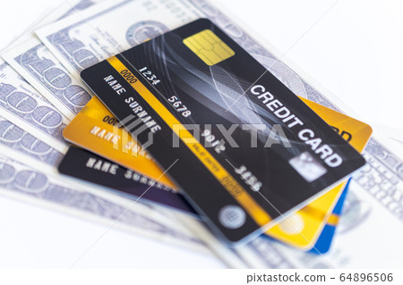 Credit cards and 100 dollars in cash Credit cards and 100 dollars in cash 64896506