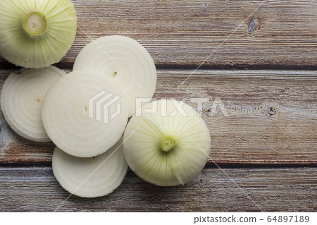 Onions on the table 64897189