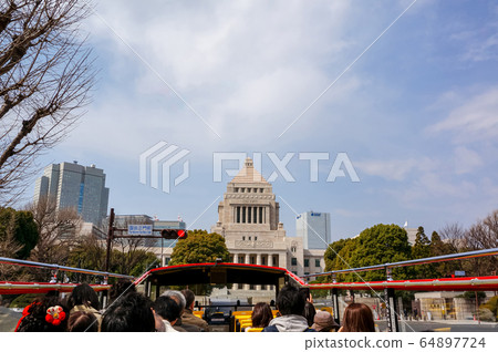 Parliament building seen from a sightseeing bus 64897724