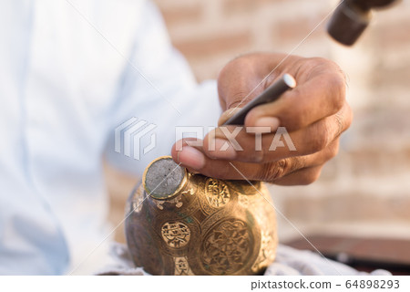 chaser of copper at work chaser of copper at work 64898293