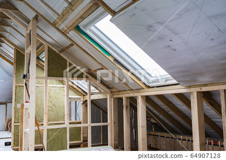 Unfinished residential loft conversion, property extension, insulated walls and ceilings, roof windows 64907128