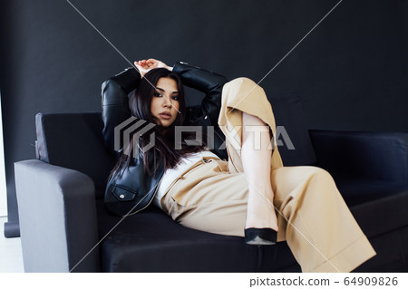 Beautiful fashionable oriental brunette woman in home clothes 64909826