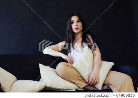 Beautiful fashionable oriental brunette woman in home clothes 64909830