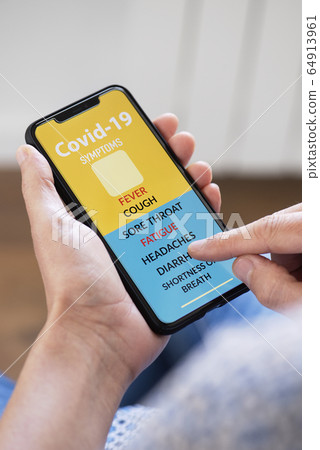man checking some symptoms of the covid-19 64913961