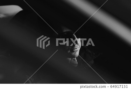 photo of businessman in glasses 64917131