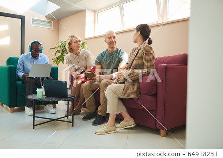 Business people working in the hall Business people working in the hall 64918231