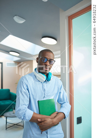 African businessman standing at office 64918232