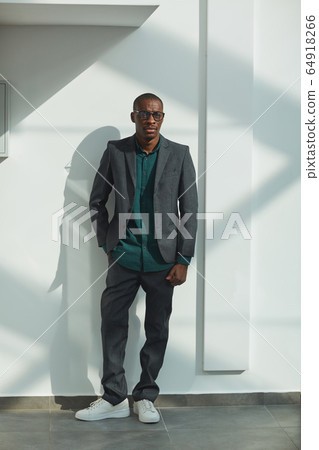 Confident African businessman Confident African businessman 64918266
