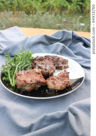 grilled pork , pork steak and beef steak 64918760