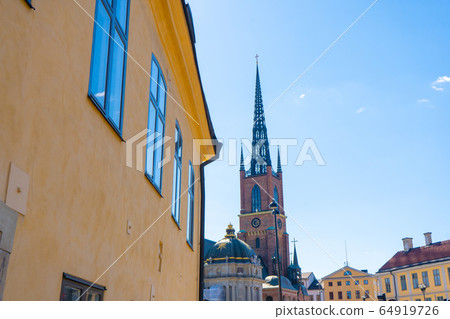 View with Riddarholm Church (Riddarholmskyrkan). Old town in Stockholm. 64919726