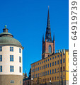 View with Riddarholm Church (Riddarholmskyrkan). Old town in Stockholm.  64919739