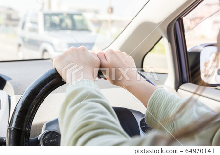 Young woman driving Young woman driving 64920141