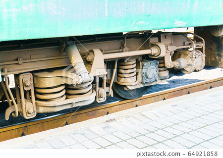 Close up view of a train wheel. 64921858