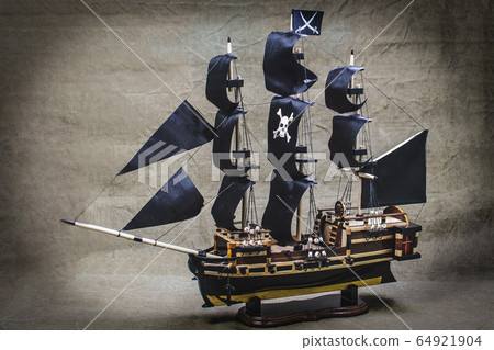 Wooden model of a handmade pirate fighting ship Wooden model of a handmade pirate fighting ship 64921904