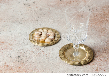 Antique brass coasters, small dish on concrete Antique brass coasters, small dish on concrete 64922227