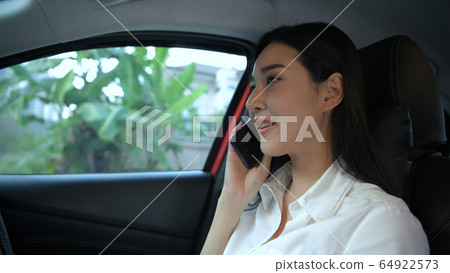 Travel Concept. A woman talking on the phone 64922573