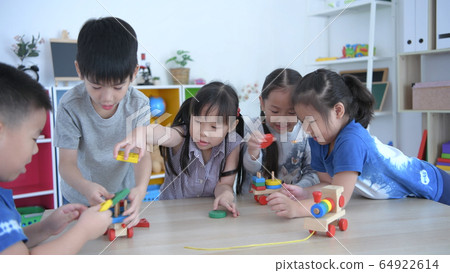 Educational concepts. Children are playing toys in 64922614