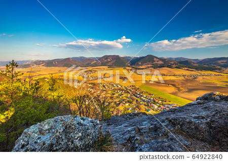 Spring landscape with valley and mountains. Spring landscape with valley and mountains. 64922840