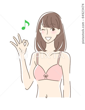 A woman who gives an OK sign with a smile 64923474